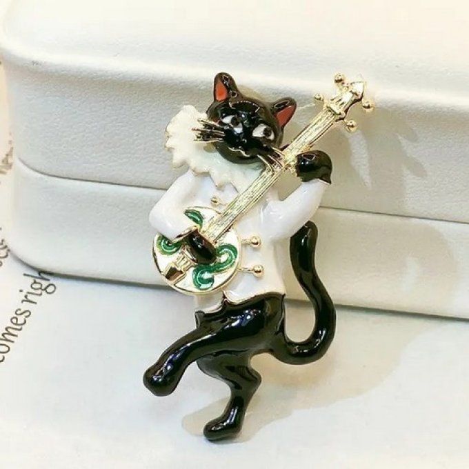 Broche chat musicien.