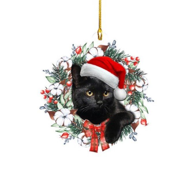Décoration de noel chat noir en acrylique au milieu des fleurs.