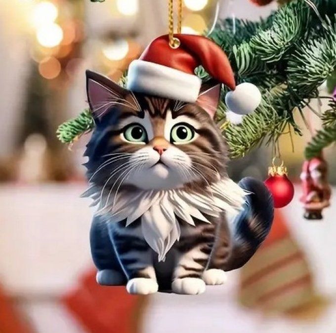 Décoration chat au bonnet de père noel rouge.