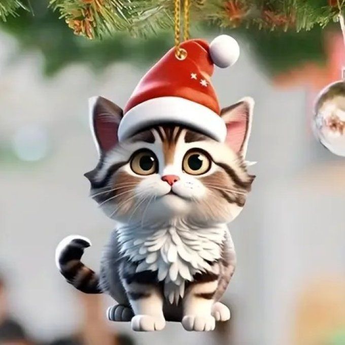 Décoration chat au bonnet de père noel rouge.