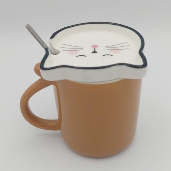 Tasse et son couvercle en tête de chat et sa cuillère.